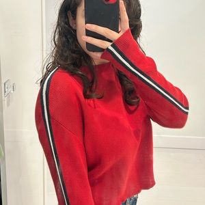 Cute dark red sweater with stripes on the side